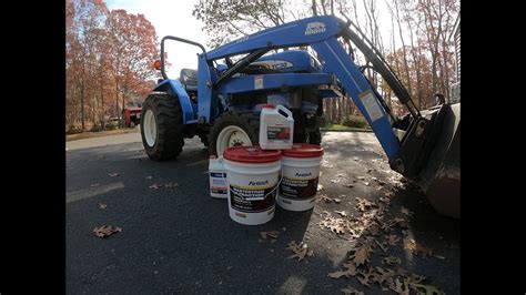 recommended hydraulic fluid for new holland skid steer|new holland hydraulic fluid change.